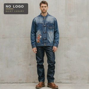 Heavy-washed denim jacket with embroidery, worn open
